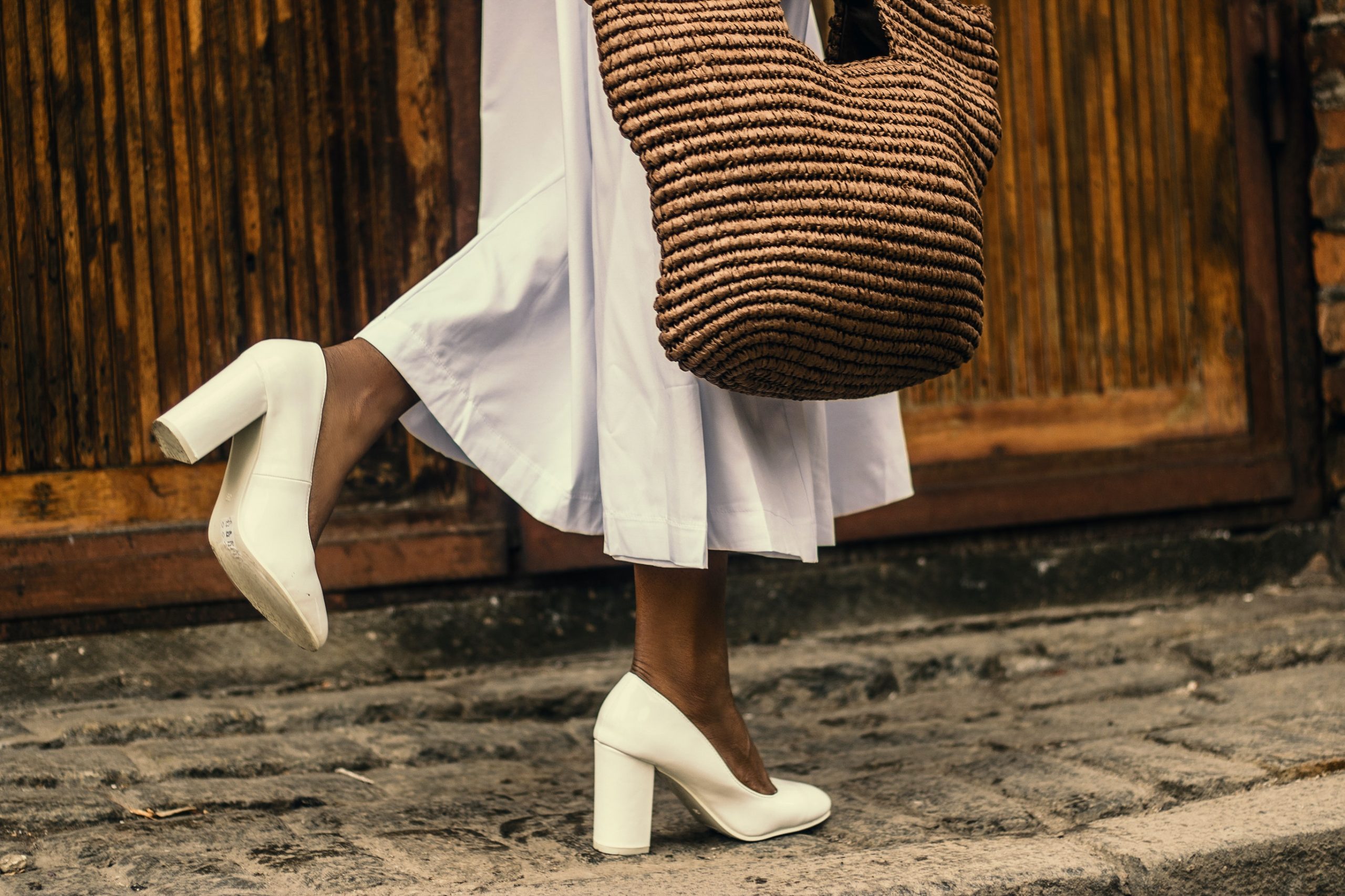 woman-wearing-white-dress-and-white-high-heeled-shoes